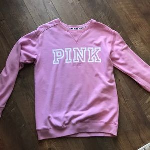 Pink brand sweatshirt.